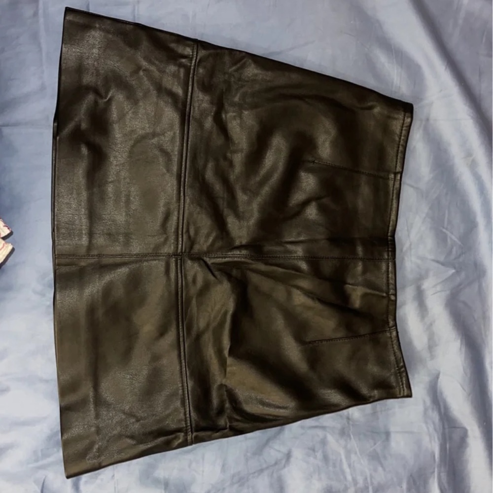 Black leather mini skirt
